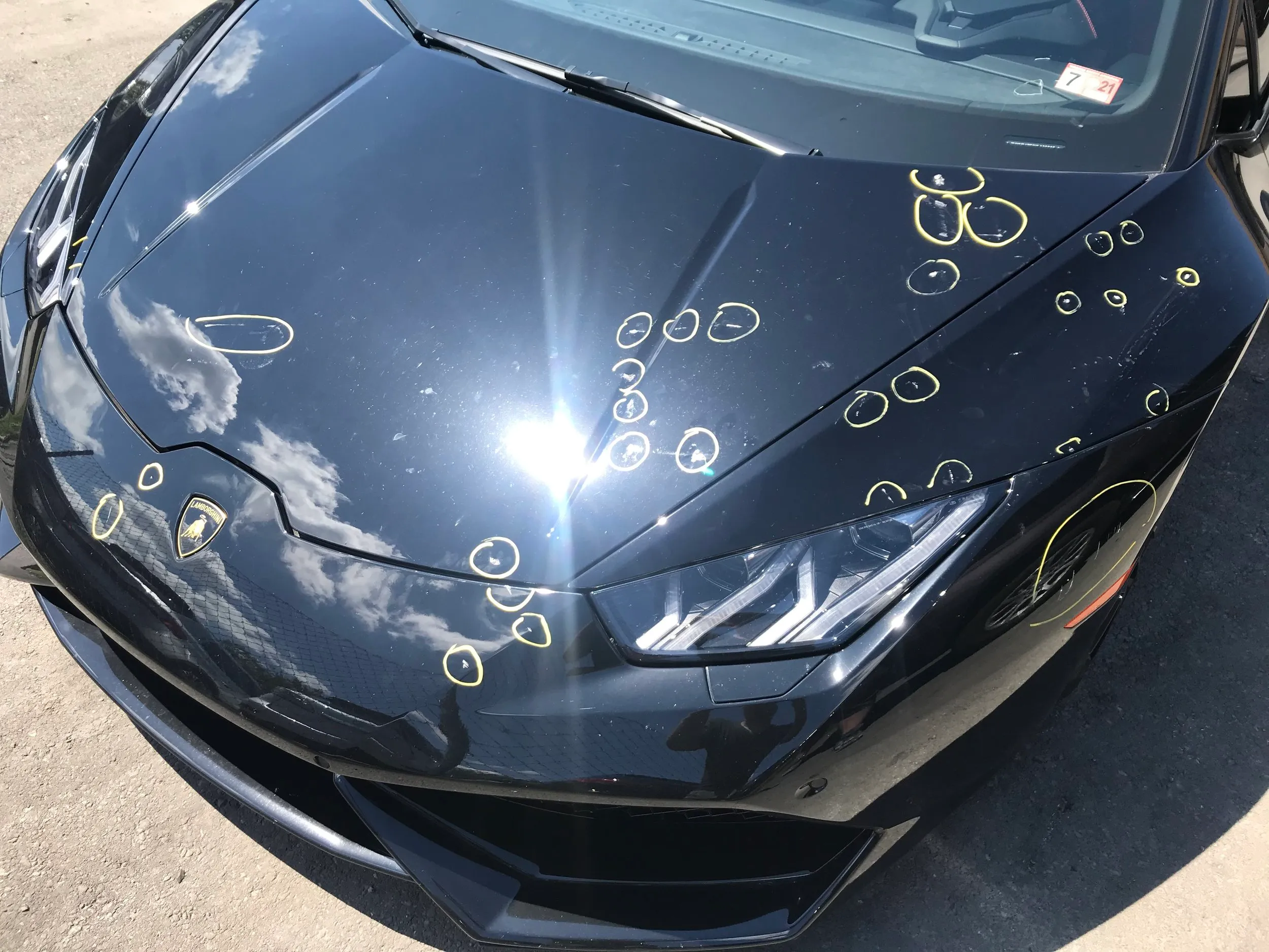 dent mapping on a black lamborghini huracan