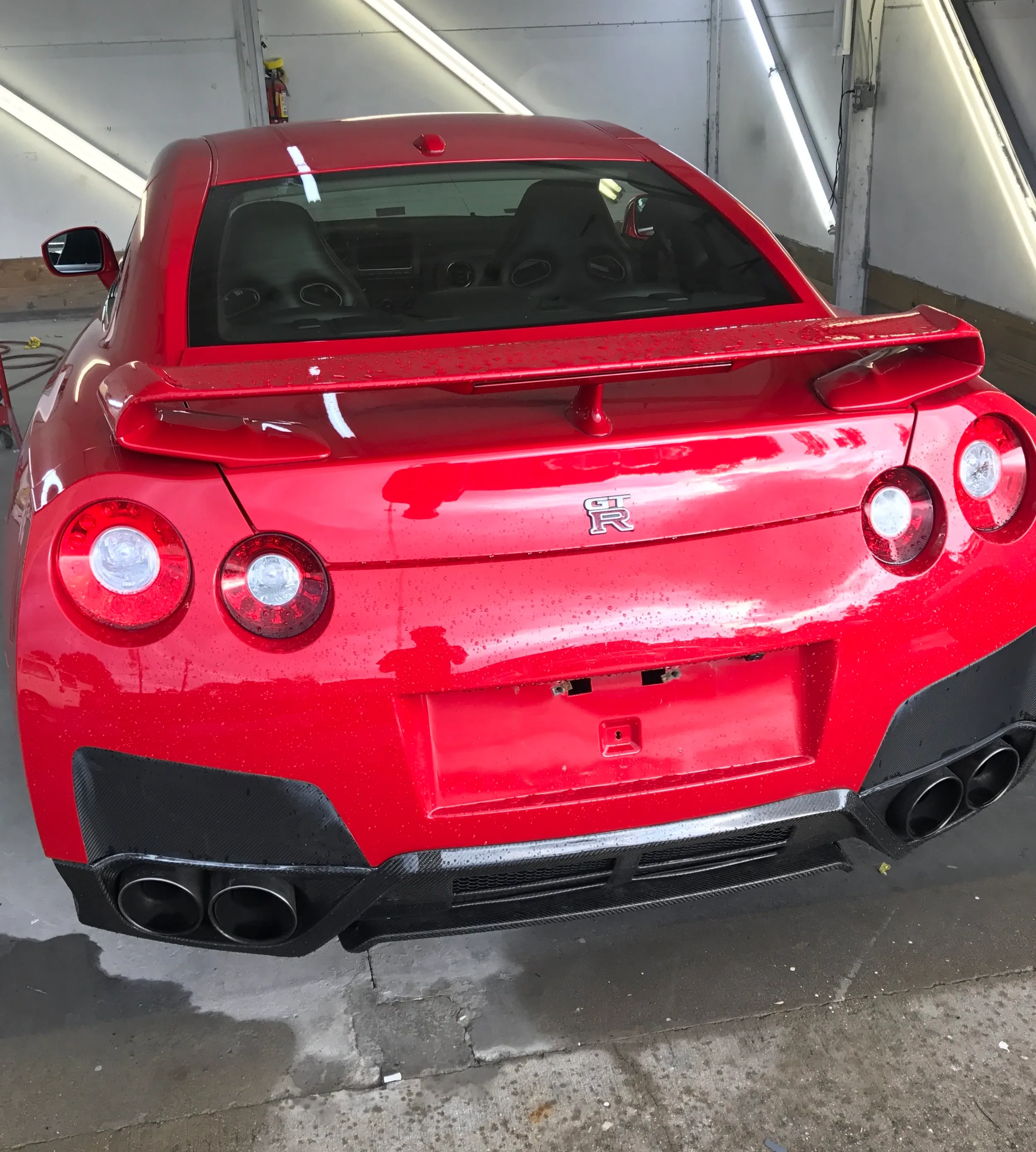 red nissan gt r after refinishing